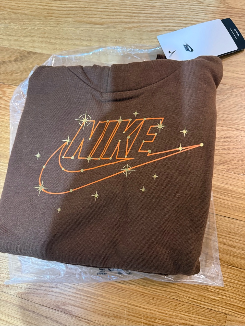 Nike Brown Kids Hoodie with Orange Star Graphic